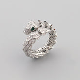 Close-up of snake ring showing coiled body and sparkling zircon stones
